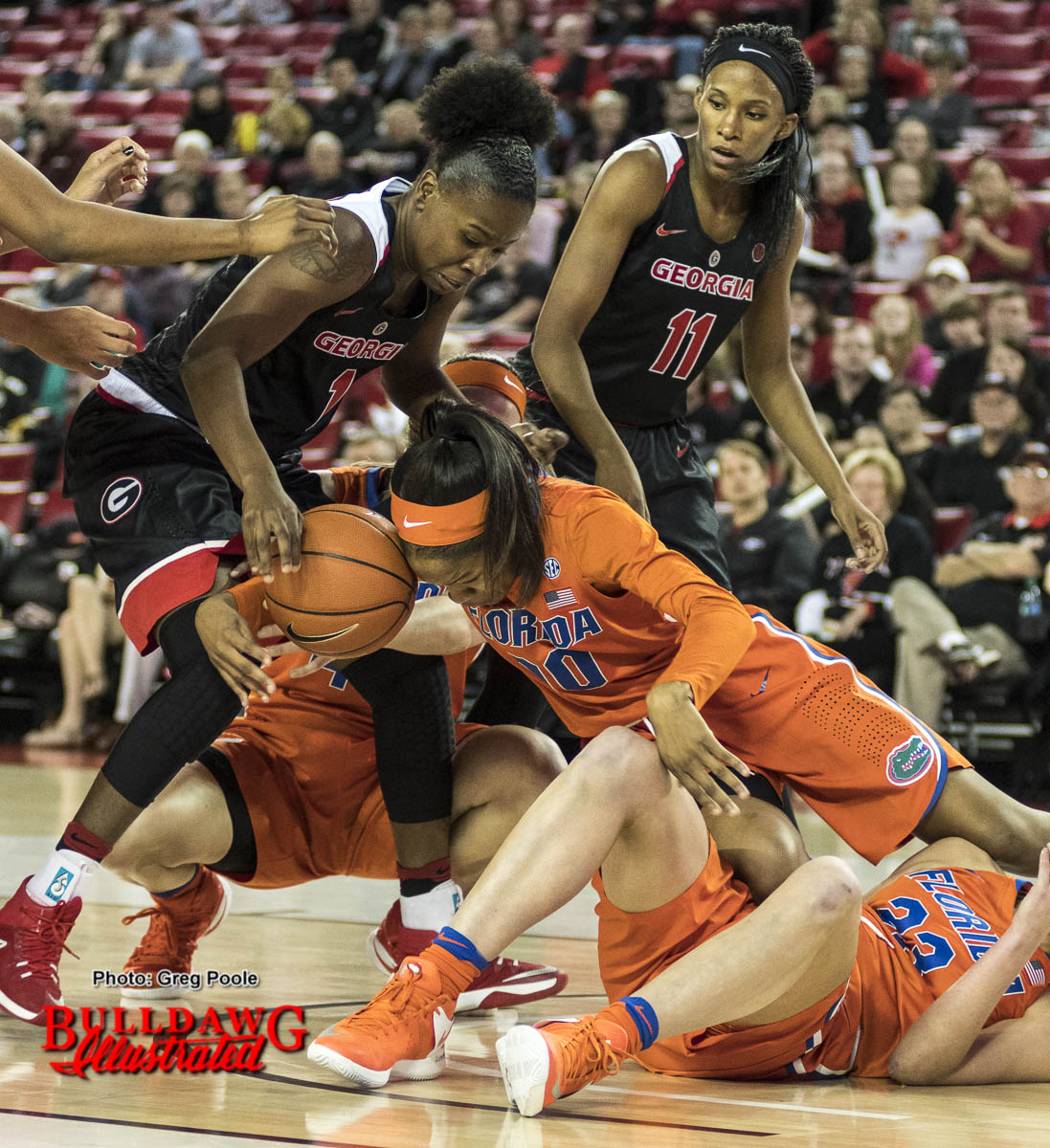 Shanea Armbrister (1) fights for a loose ball vs. Florida