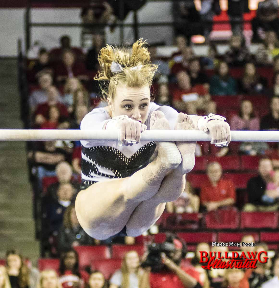 Hayley Sanders eyes the other bar during her routine.