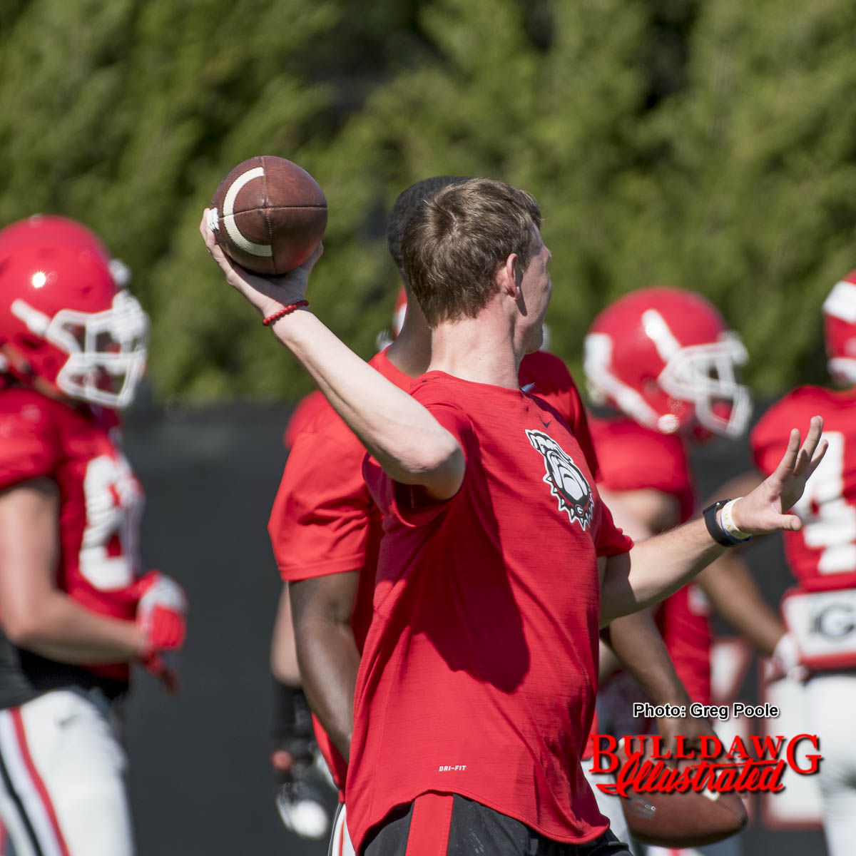 Brice Ramsey throws a pass while helping out at practice.