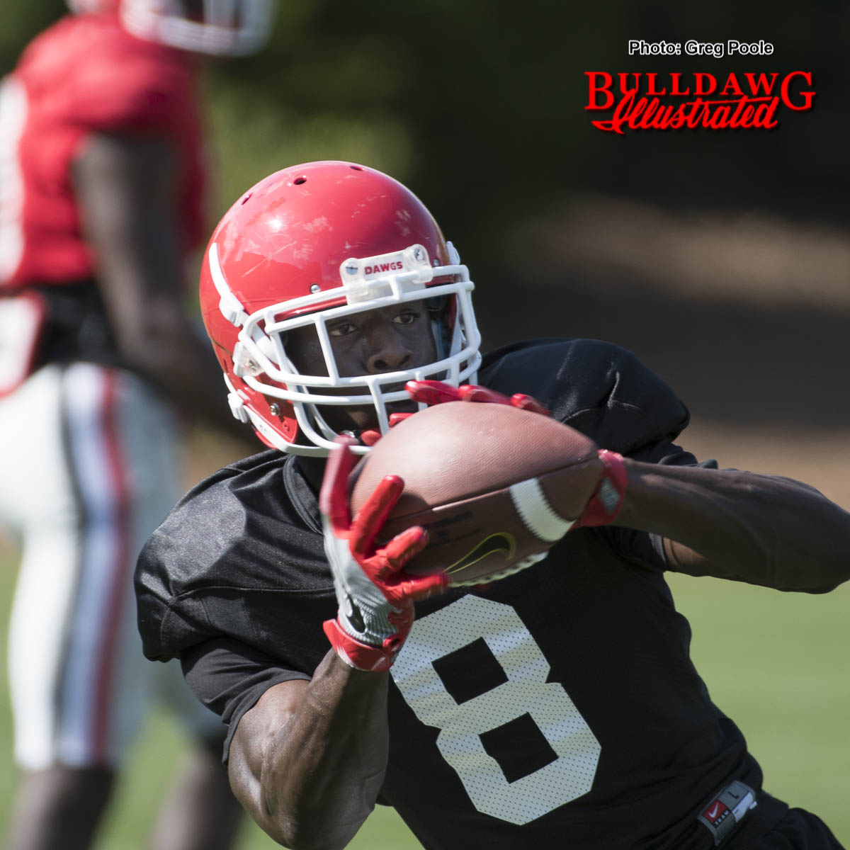 Sophomore WR Riley Ridley hauls in a pass from from QB Jacob Eason during Georgia's 10th practice of spring