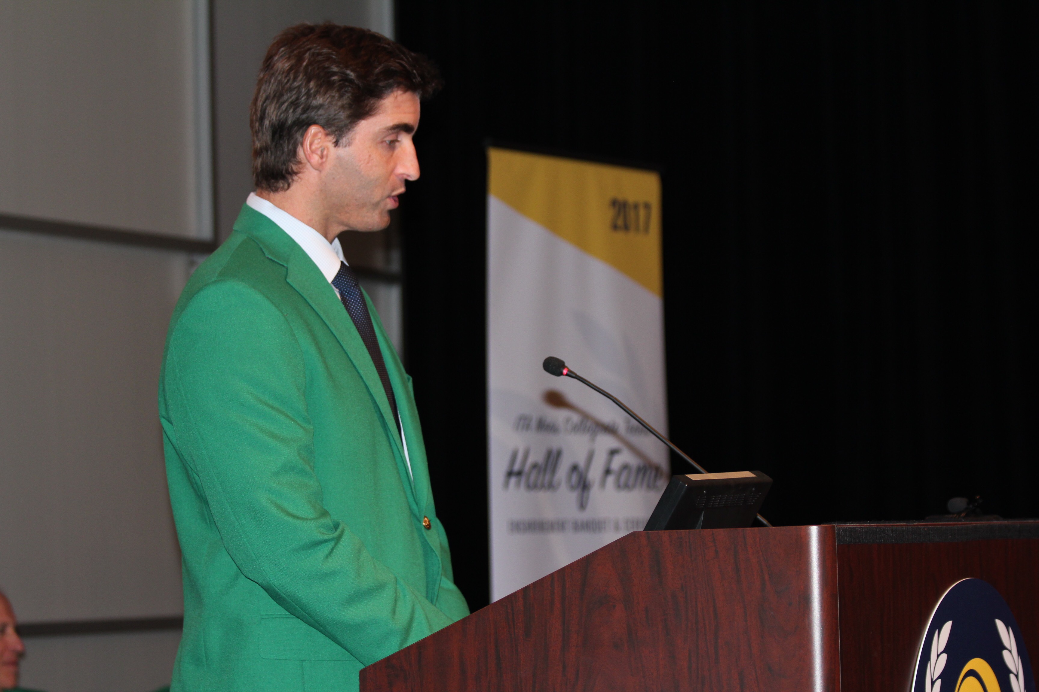 Matias Boeker speaks during his induction into the Intercollegiate Tennis Association Hall of Fame 