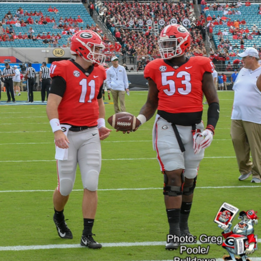 Jake Fromm (11) and Lamont Gaillard (53)