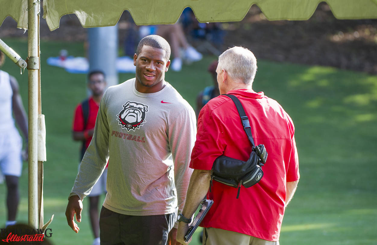 Nick Chubb and Ron Courson chat prior to Kirby Smart camp day 2