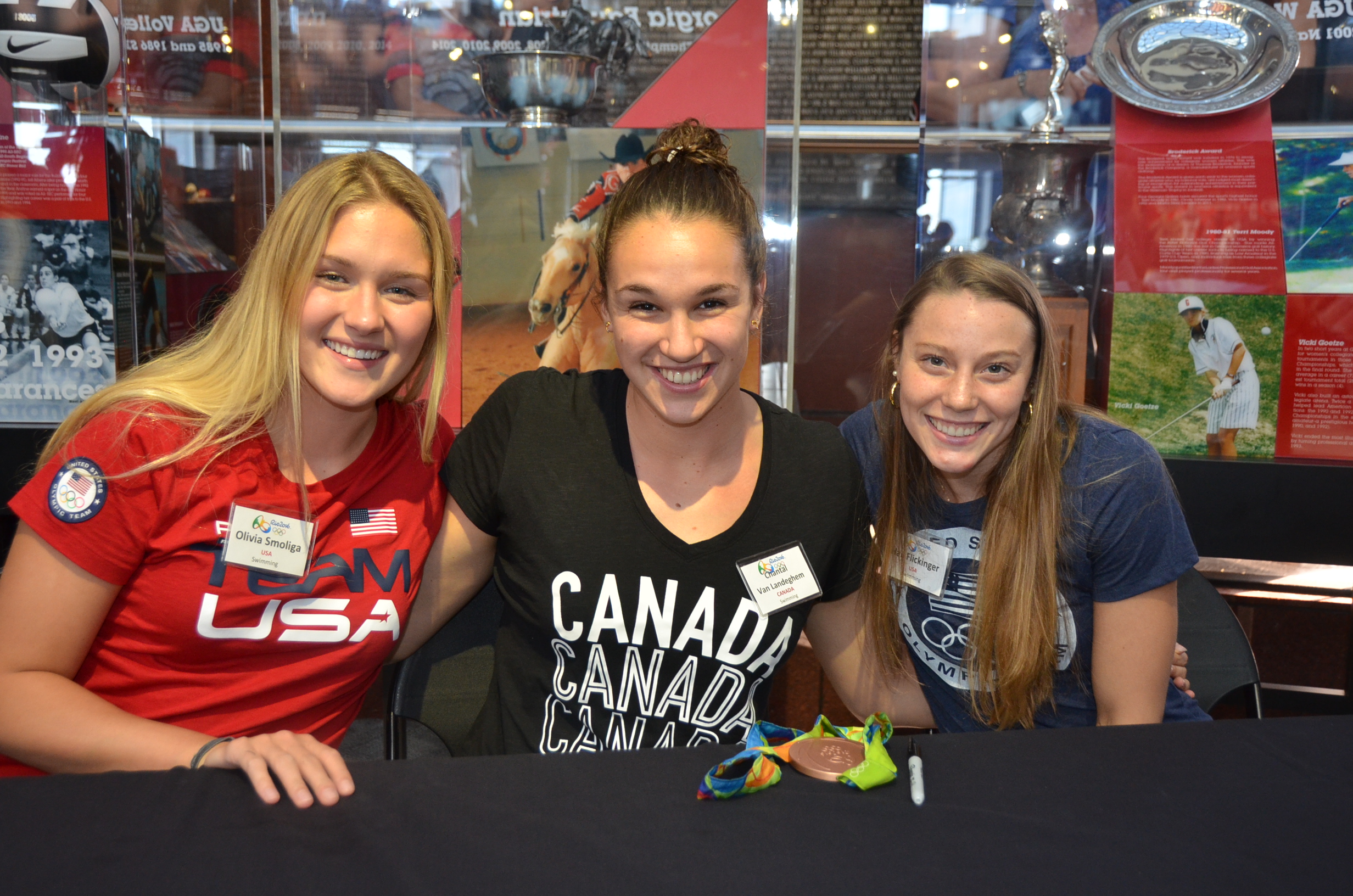 Olivia Smoliga, Jan Landeghem and Hali Flickinger