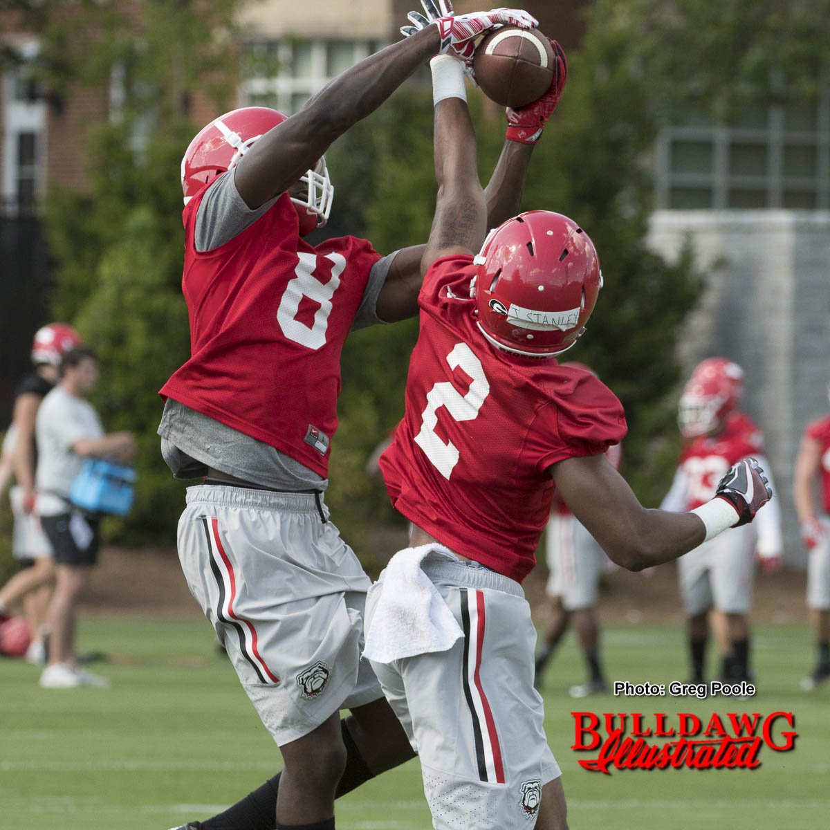 Riley Ridley grabs the pass as Jayson Stanley defends