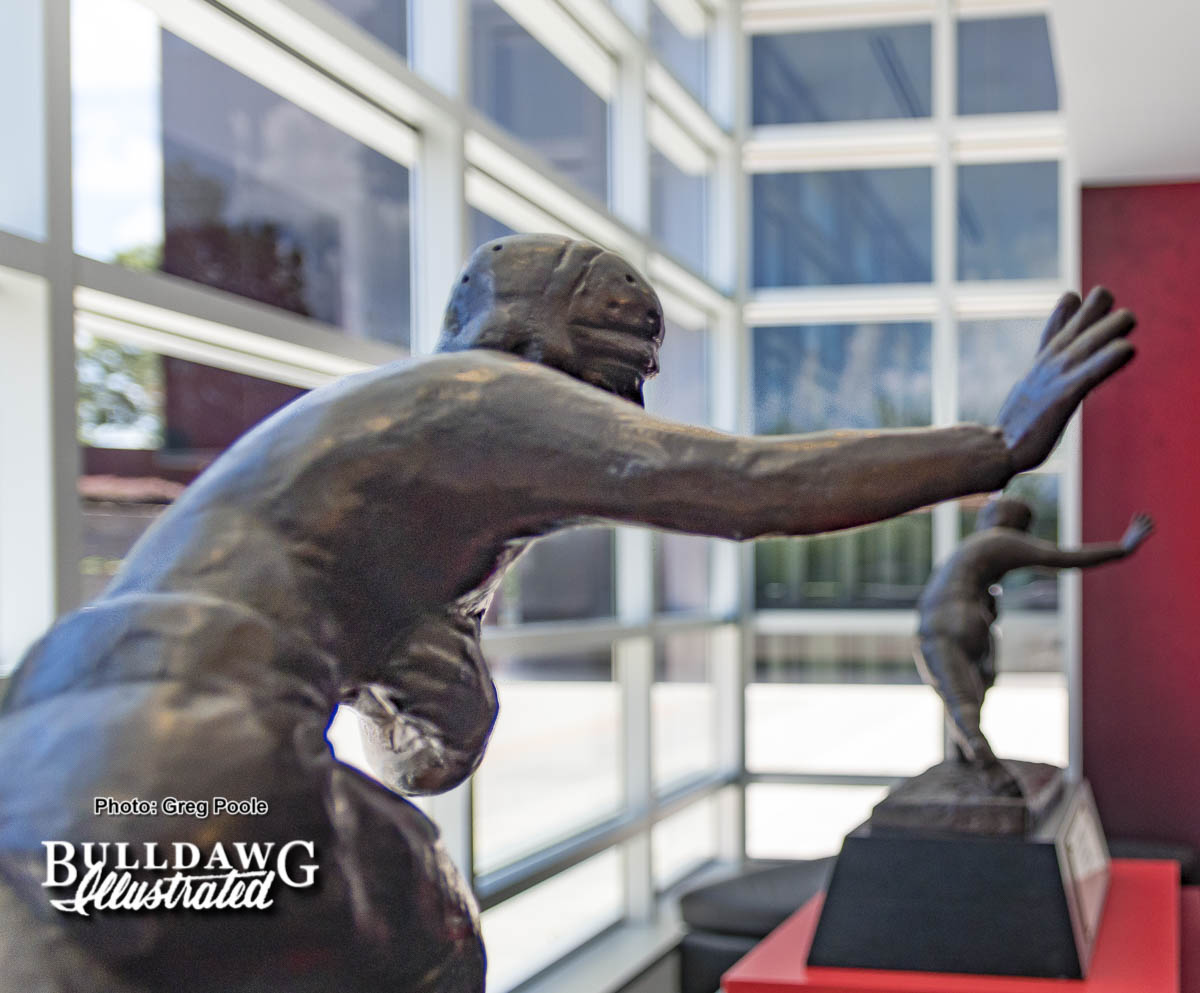 Herschel's Heisman with Sinkwich's in the background