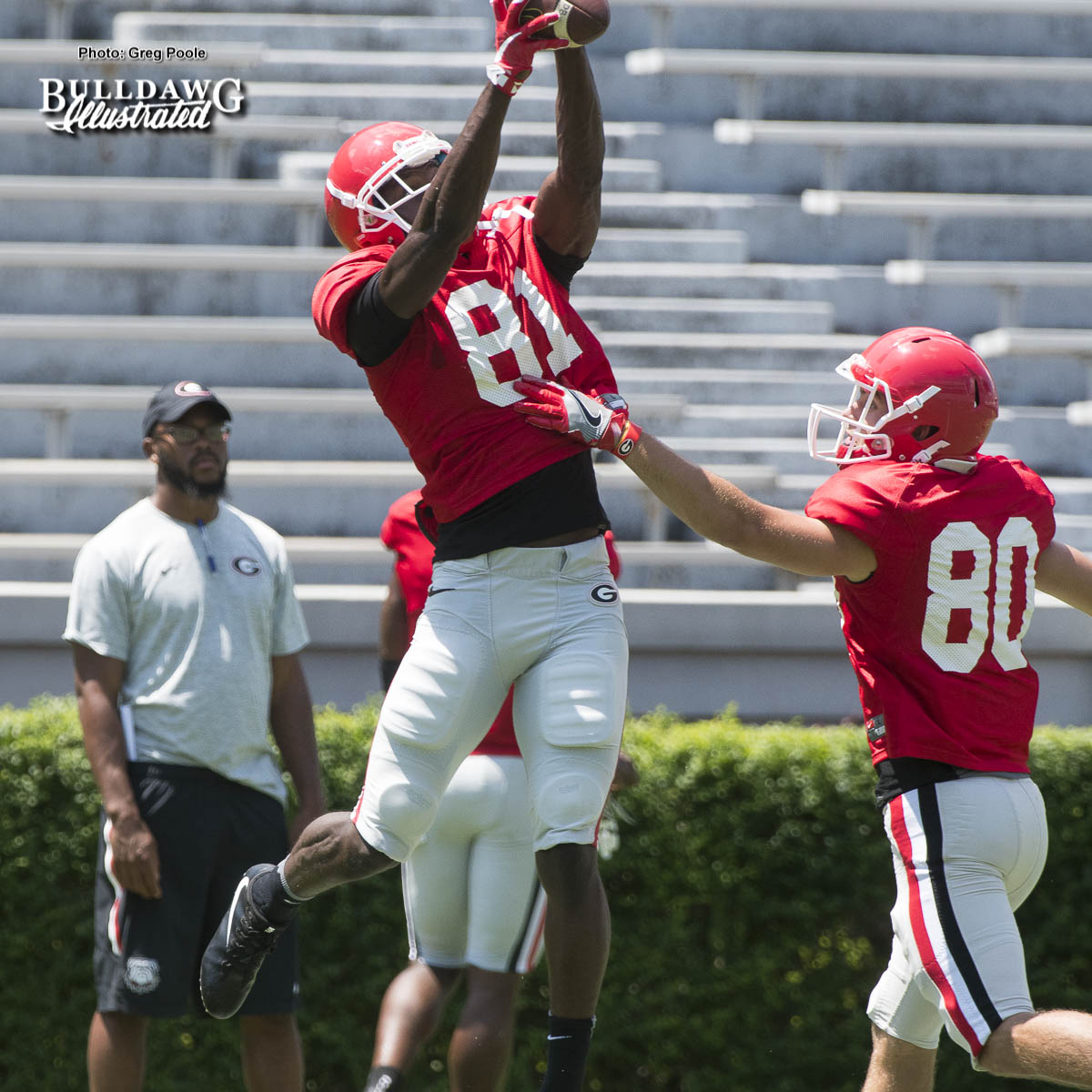 Freshman WR Mark Webb Jr. (81) climbs the ladder to make the catch over WR J.T. Dooley (80) - Georgia's 1st scrimmage of Fall Camp - Saturday, August 12, 2017
